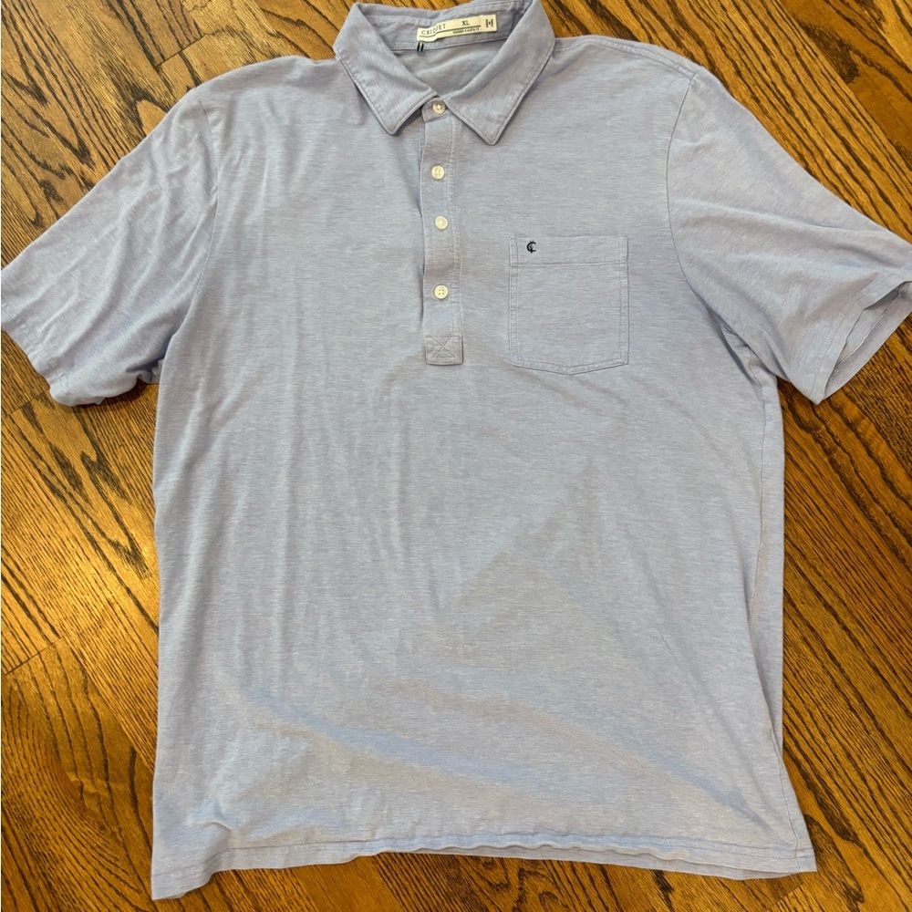 Criquet players polo in light blue. Size: XL